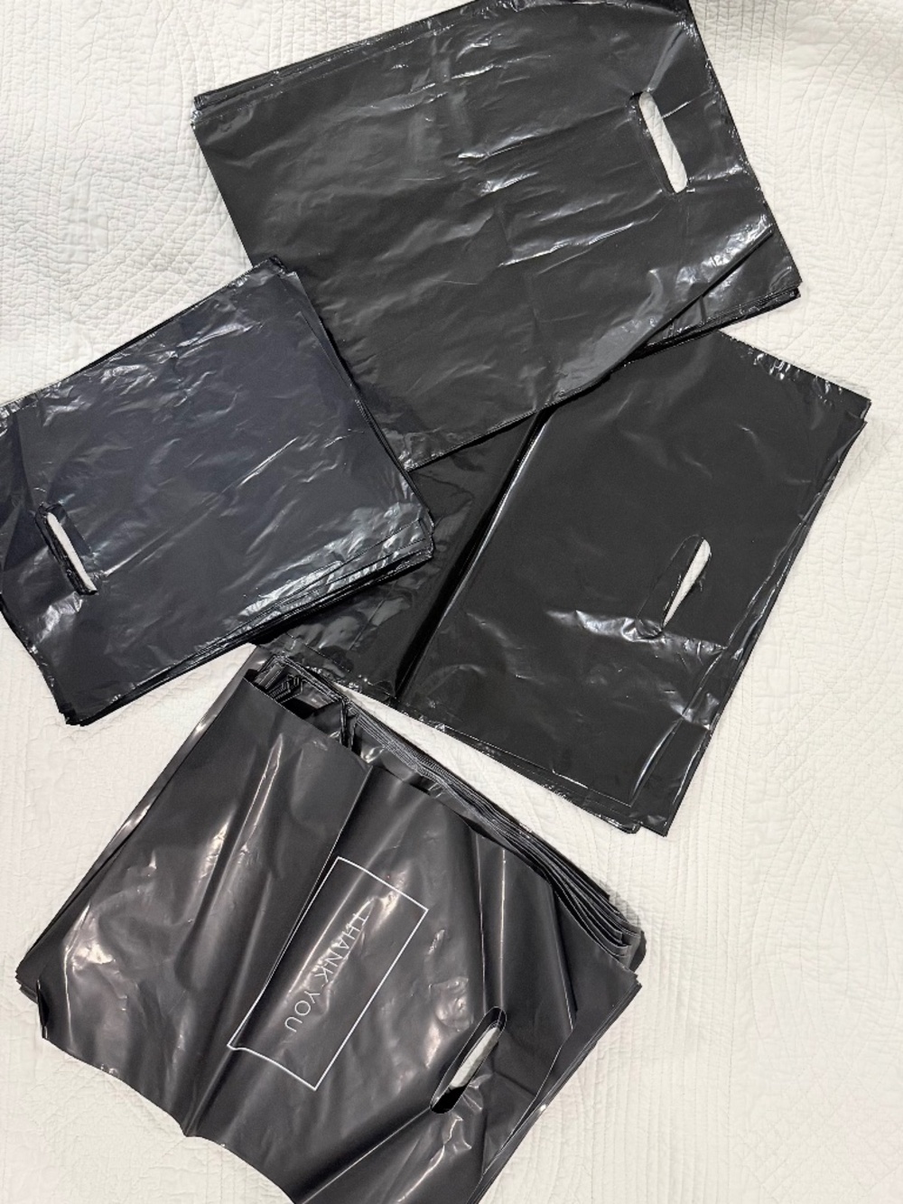 Retail Black Plastic bas with cutout handles